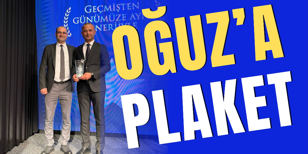 Oğuz’a başarı plaketi